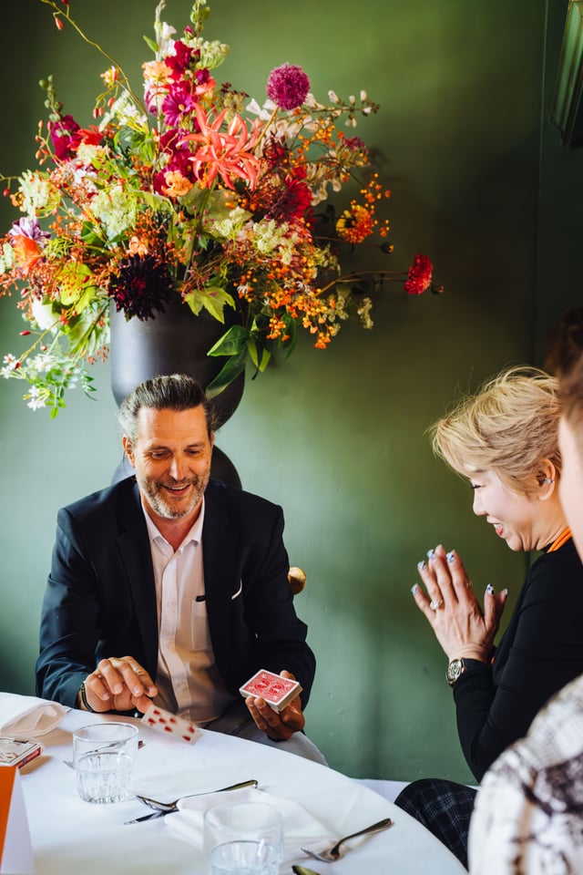 Corporate magician Nice performing for agency event guests during a hospitality reception