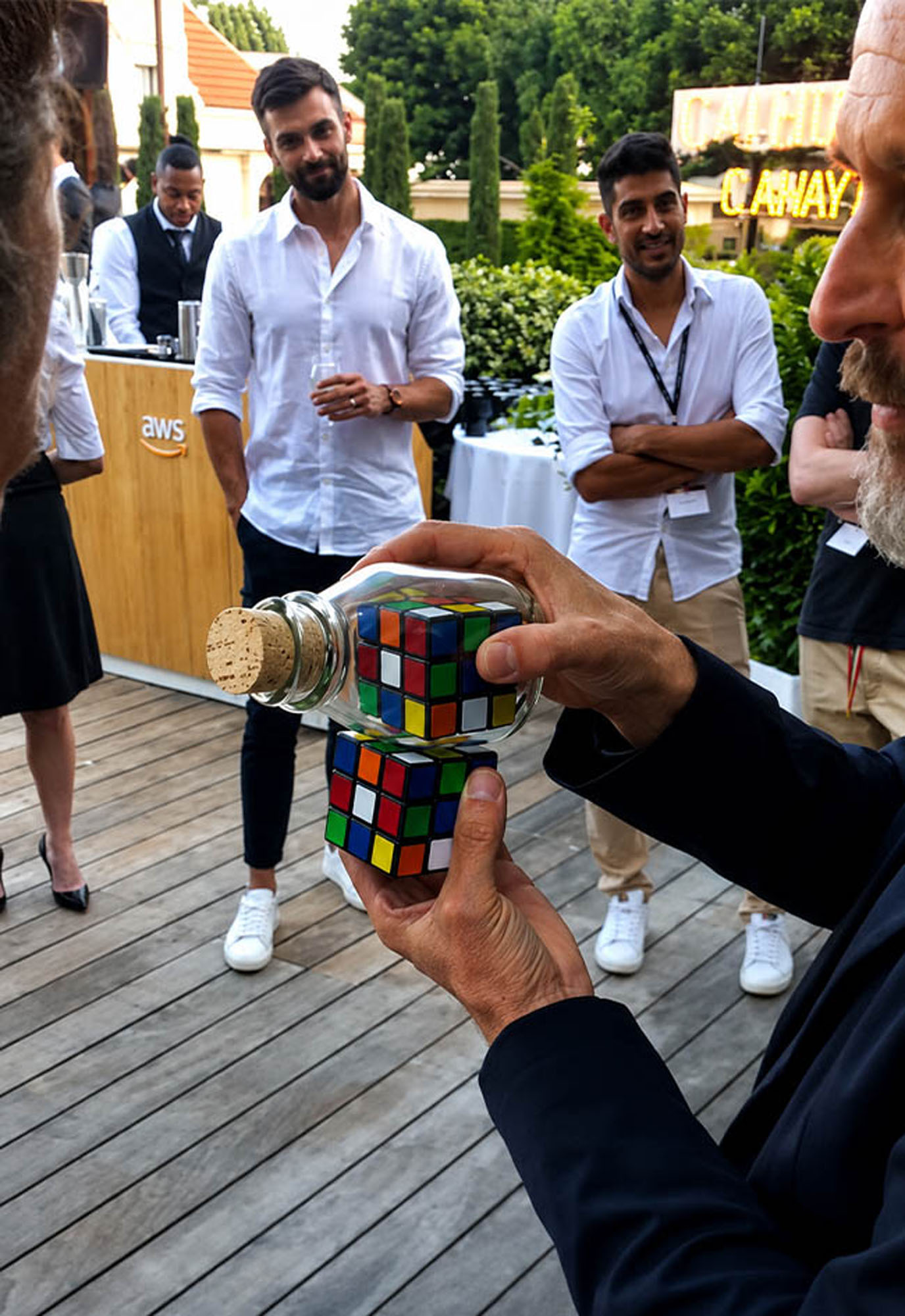 Sieko performing close-up magic during an AWS and Ferrari private hospitality event in Monaco