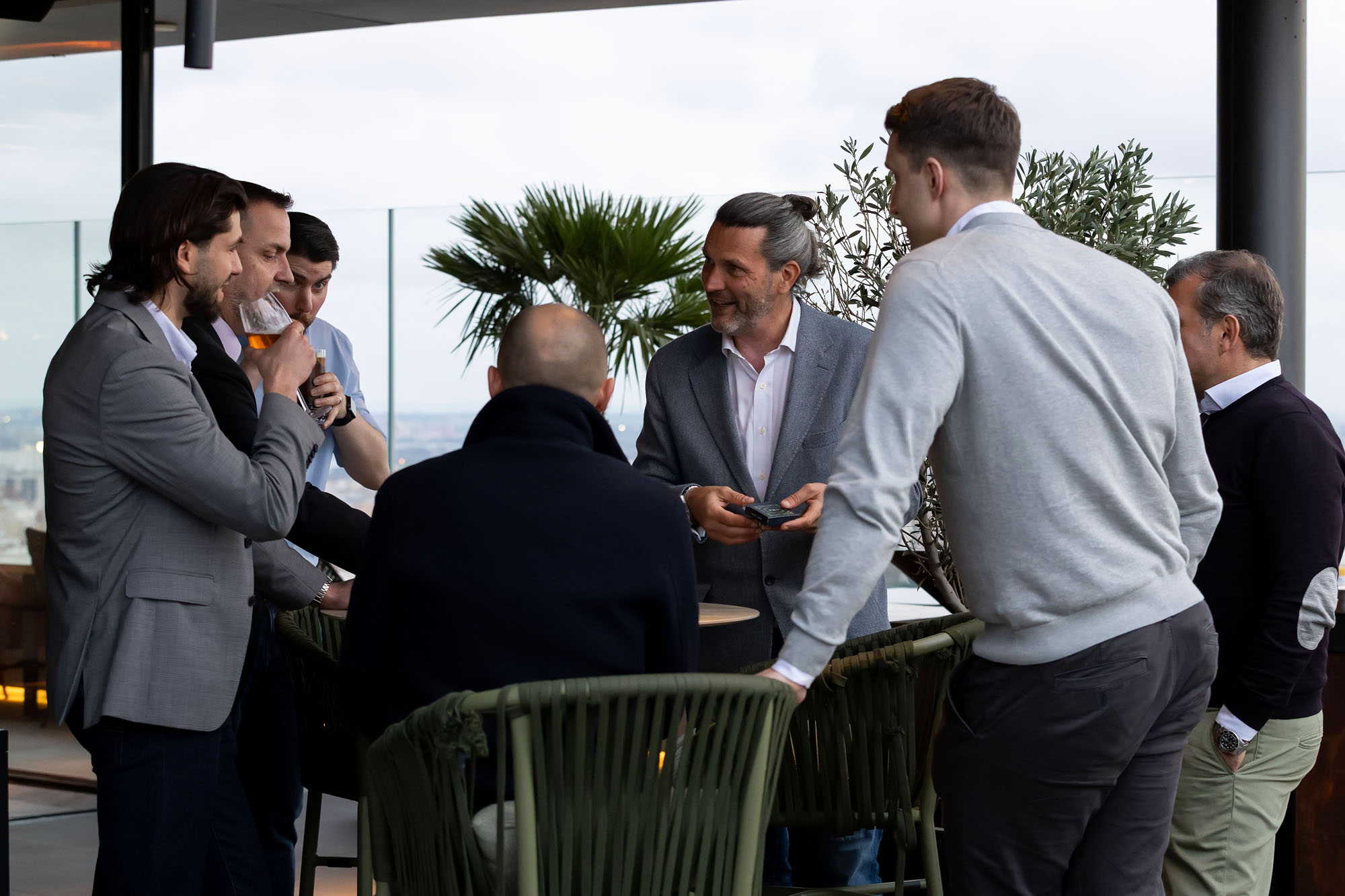 Corporate magician and mentalist performing for an executive audience at a premium event
