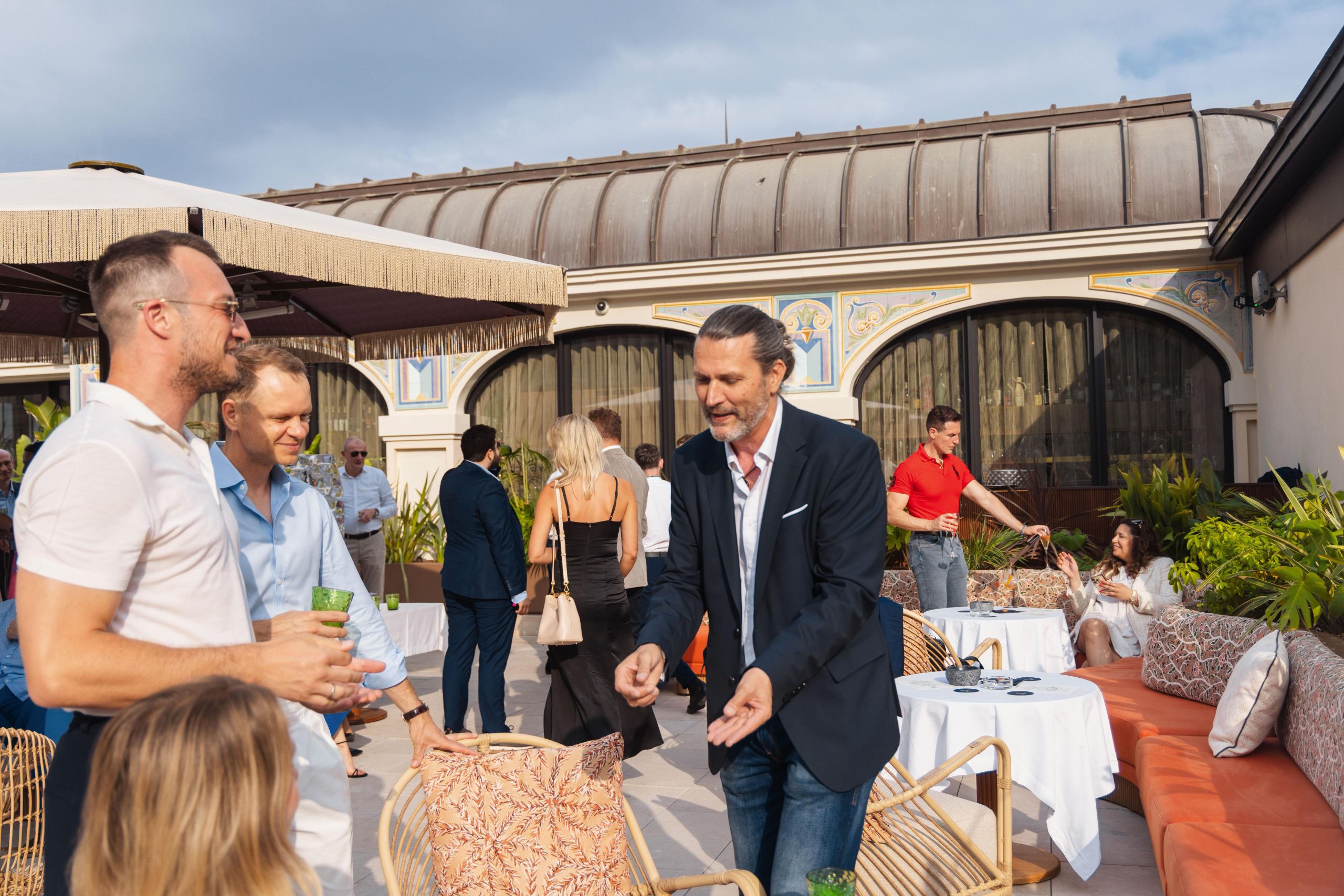 Monaco magician performing at a private hospitality event with international guests